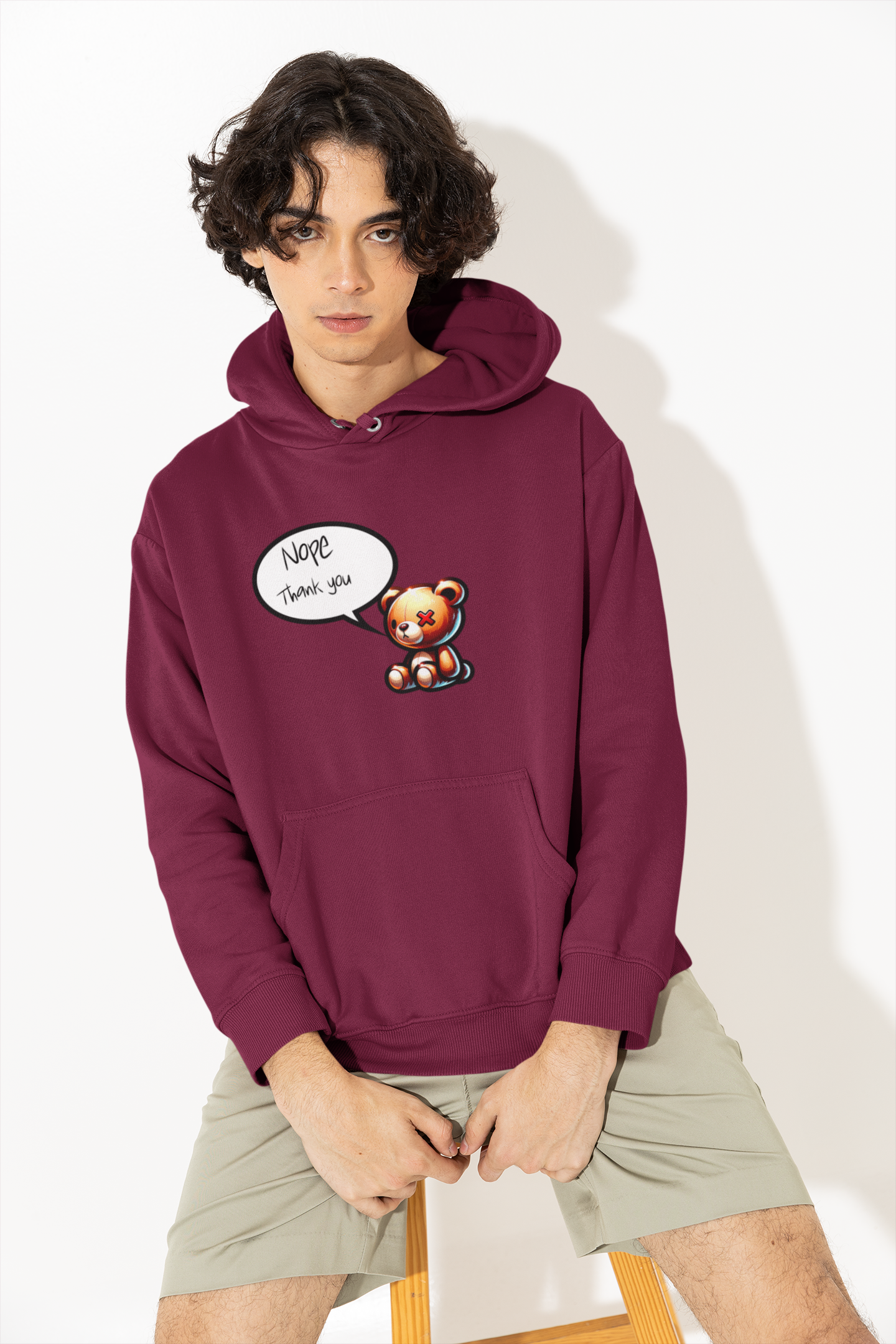 Cute Hoodies burgundy iconic hood male sitting down front posing 