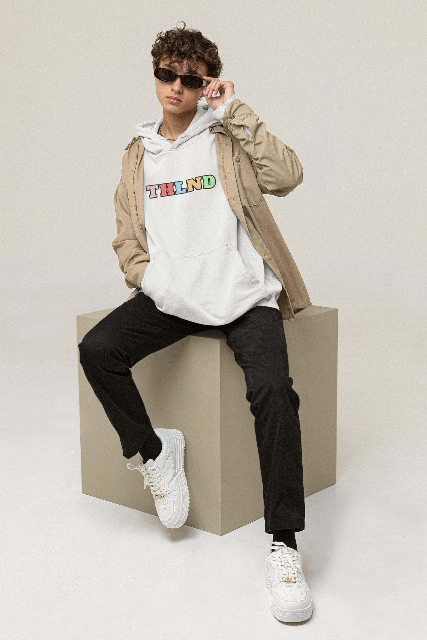 Best hoodies classic hood collection male sitting down front posing   